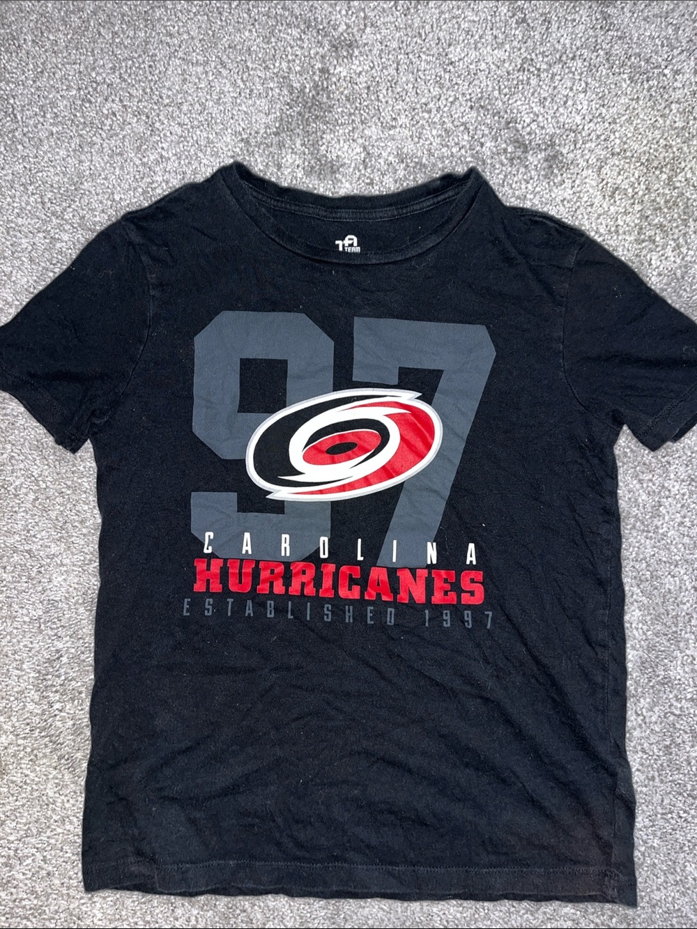 Black kids youth Carolina hurricanes hockey t shirt L Boys 10-12 (Medium)